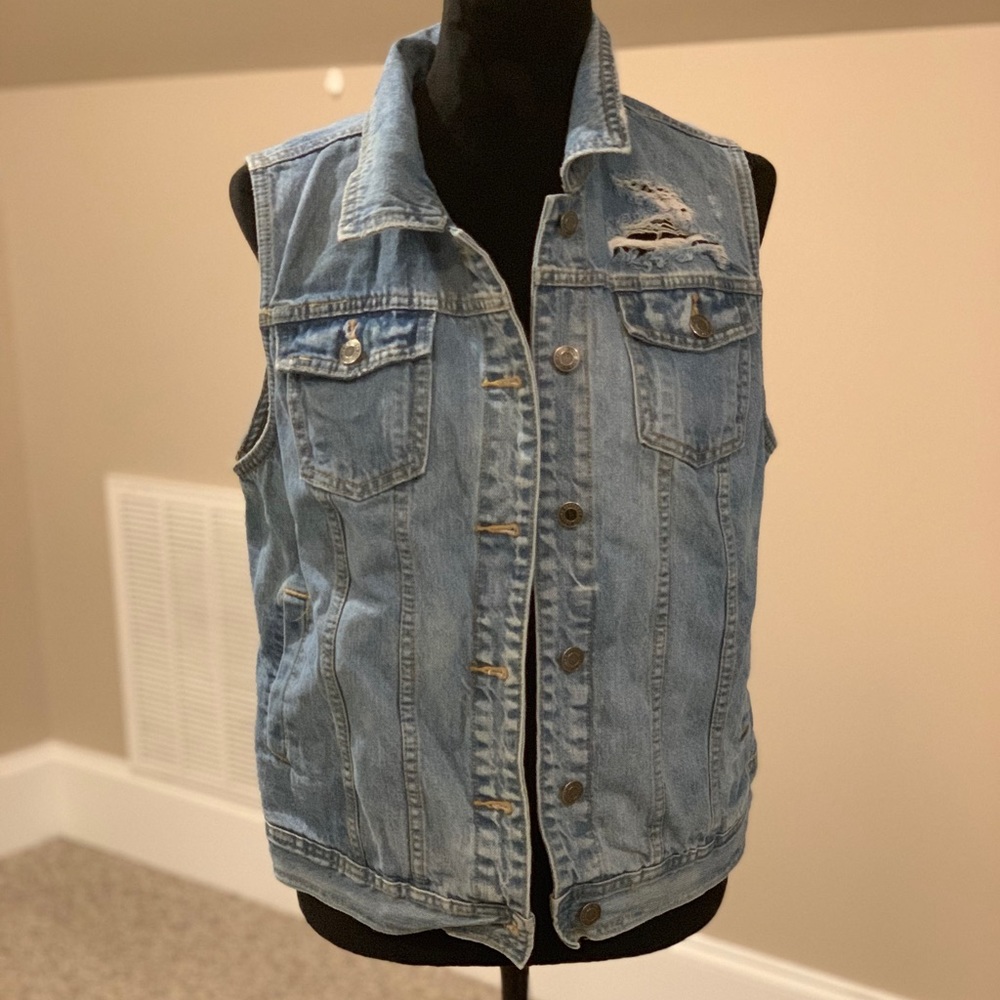 Distressed denim vest
